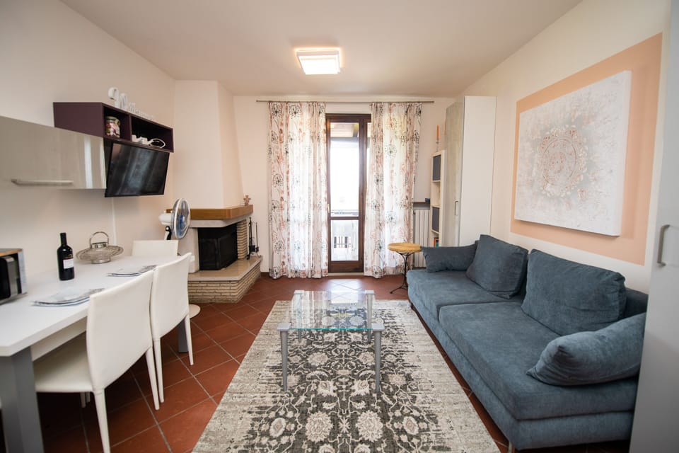Family Apartment | Living area | 50-inch TV with cable channels