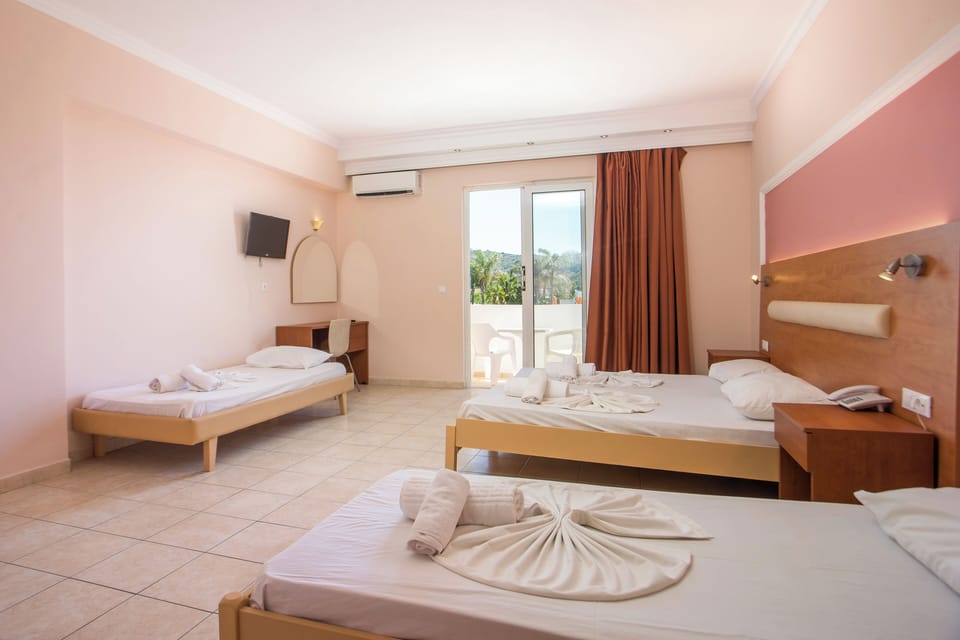 Blackout drapes, iron/ironing board, free WiFi, bed sheets