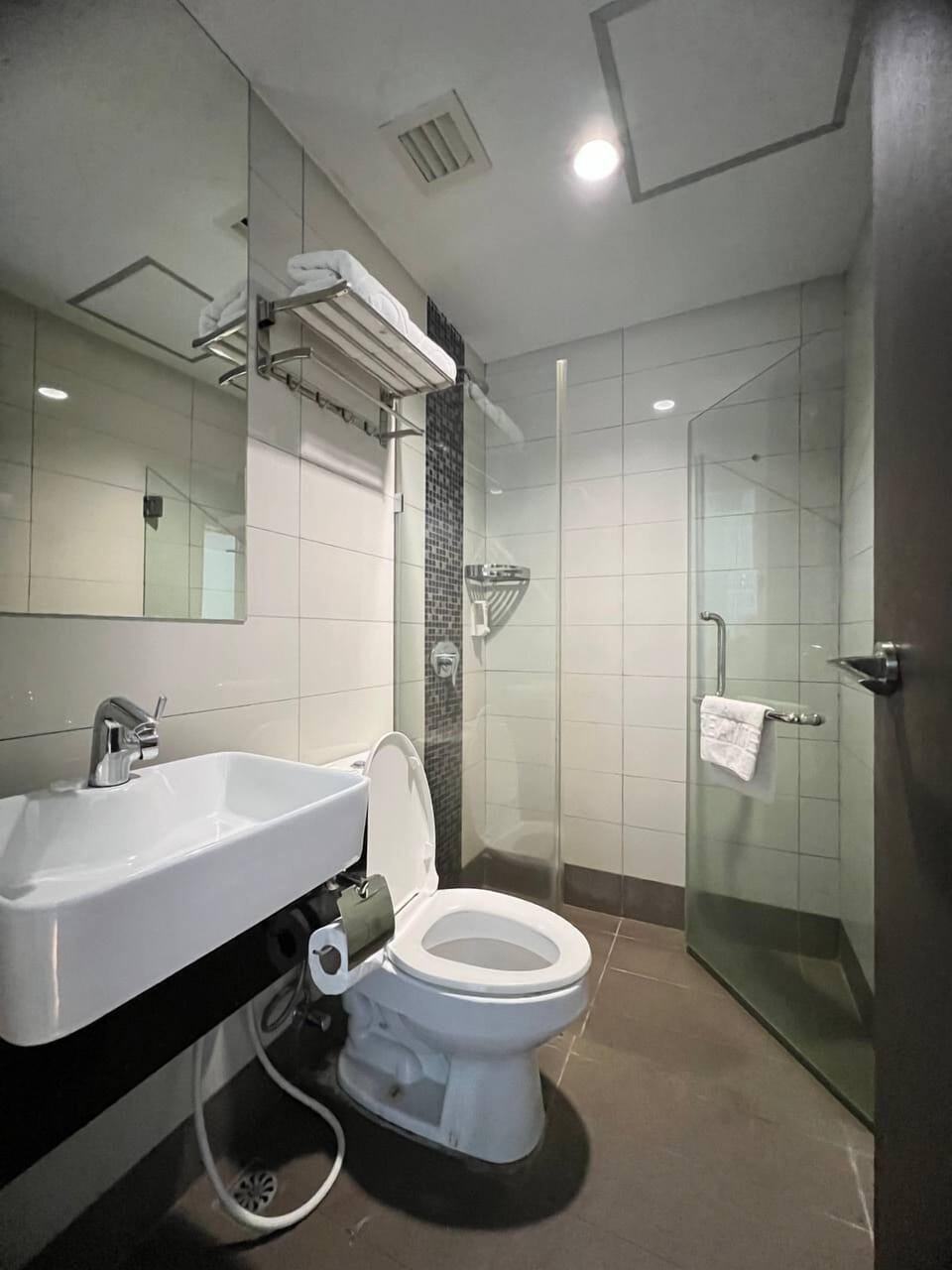 Shower, free toiletries, hair dryer, slippers