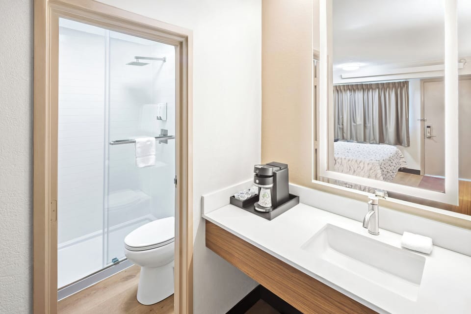 Combined shower/tub, eco-friendly toiletries, hair dryer, towels
