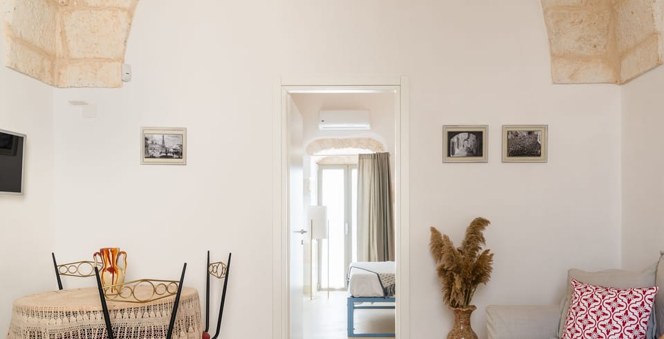 Comfort Apartment | Living area | 24-inch flat-screen TV with cable channels, TV