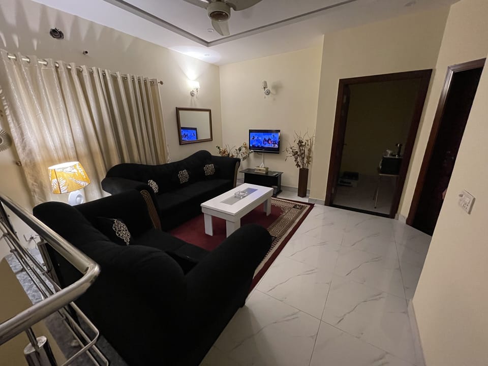 House | Living room | 30-inch TV with digital channels