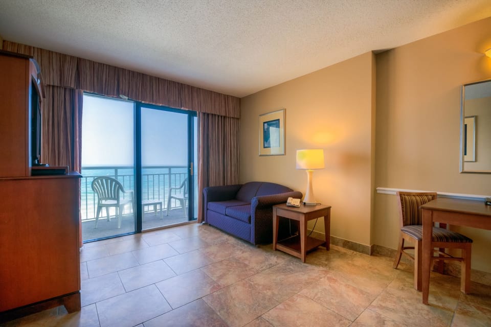 Suite, Oceanfront | In-room safe, blackout drapes, iron/ironing board, bed sheets