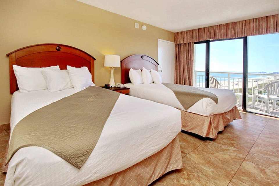 Standard Room, 2 Double Beds, Partial Sea View | In-room safe, blackout drapes, iron/ironing board, bed sheets
