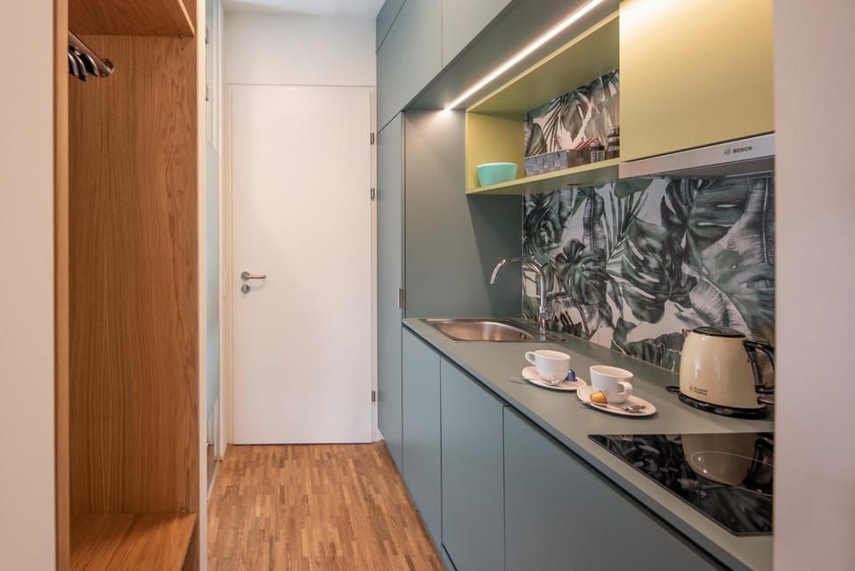 Fridge, stovetop, espresso maker, coffee/tea maker