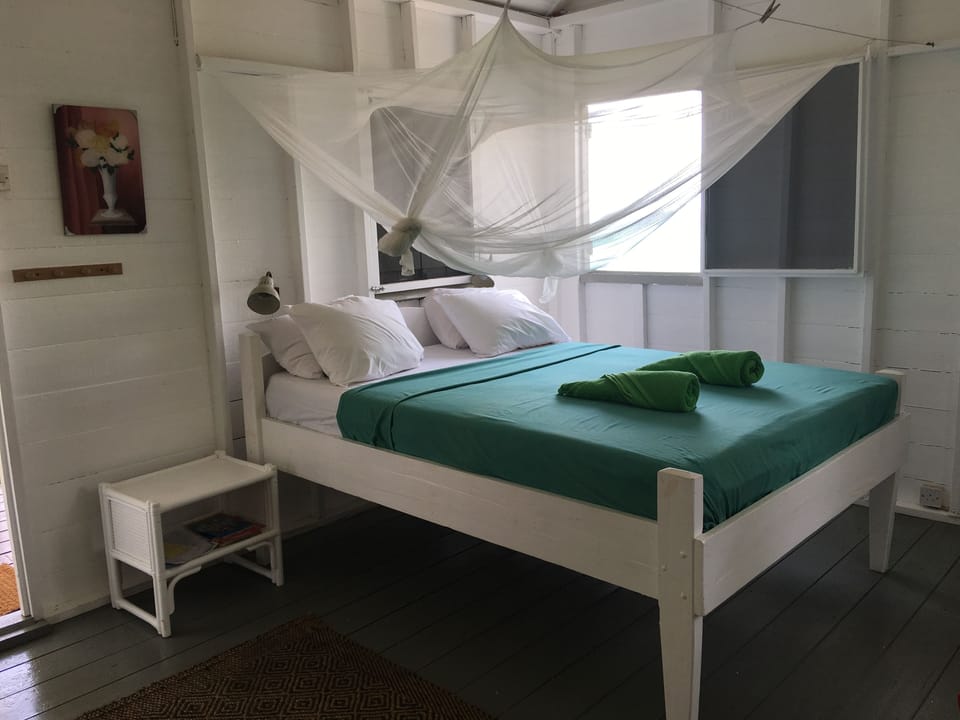 Cottage, 1 Queen Bed, Ocean View | Individually decorated, individually furnished, desk