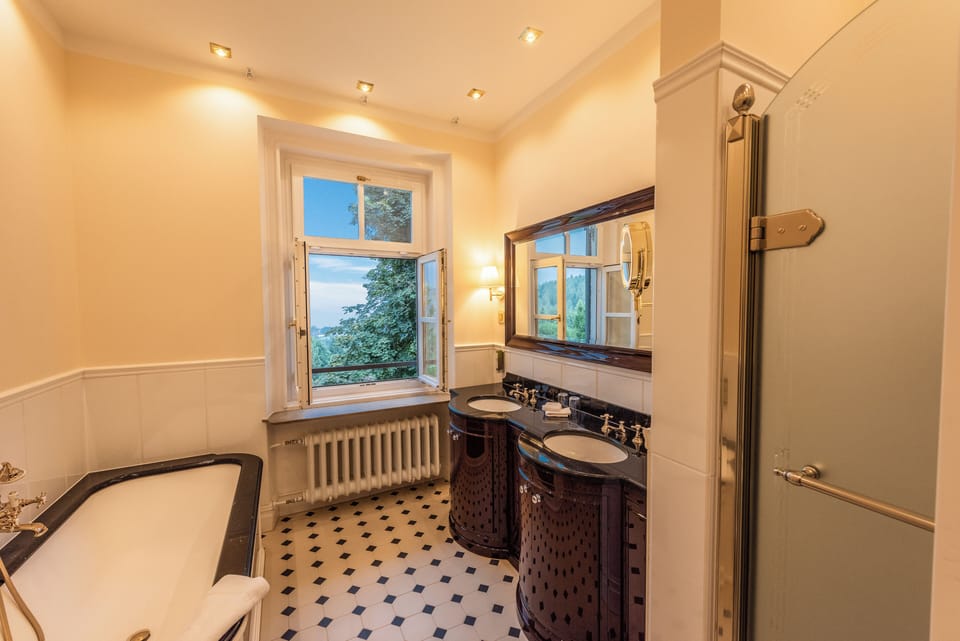 Separate tub and shower, deep soaking tub, designer toiletries