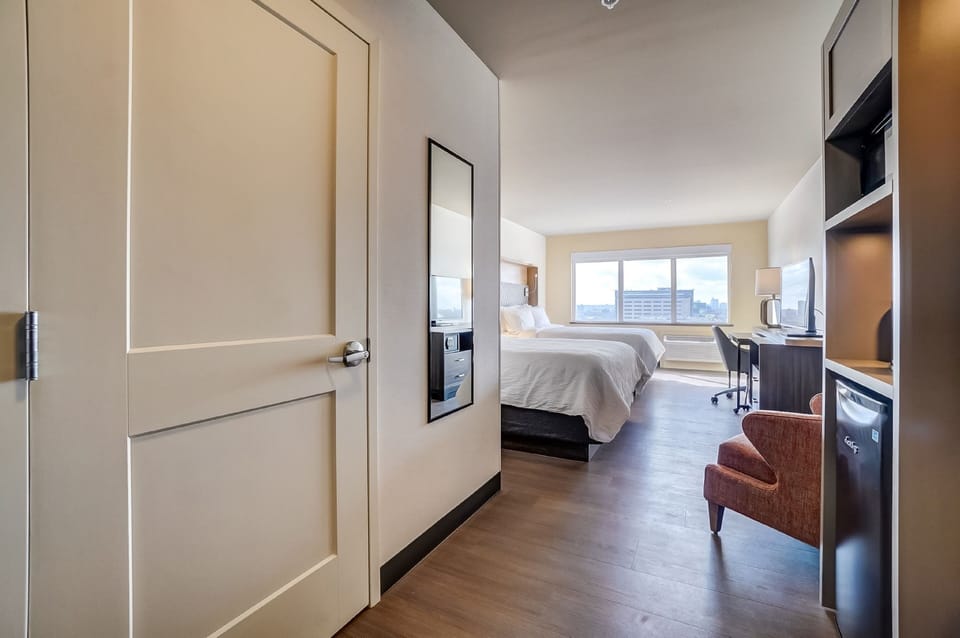 Standard Room, 2 Queen Beds | In-room safe, desk, soundproofing, iron/ironing board