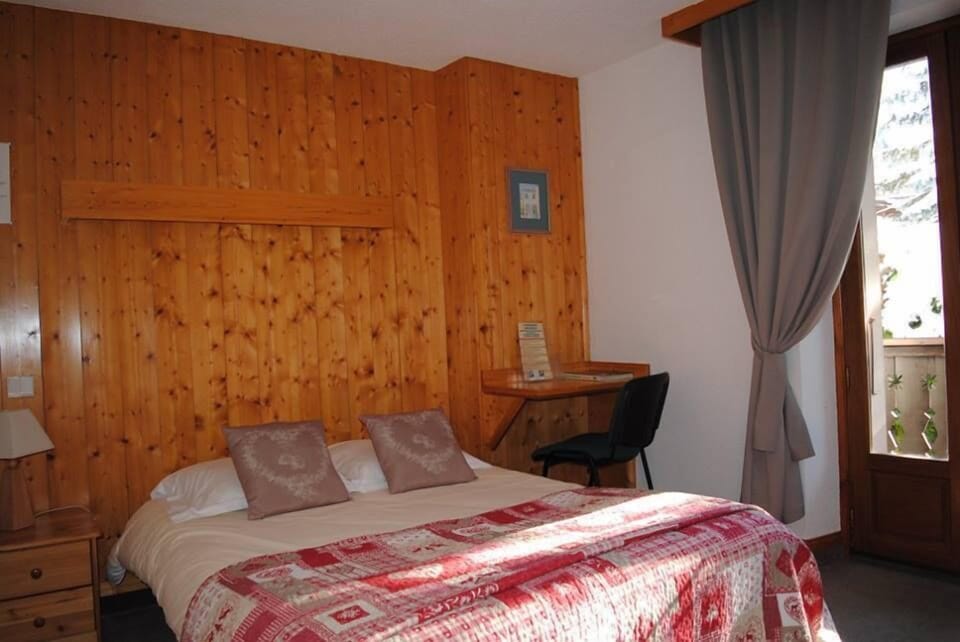 Premium bedding, desk, iron/ironing board, rollaway beds
