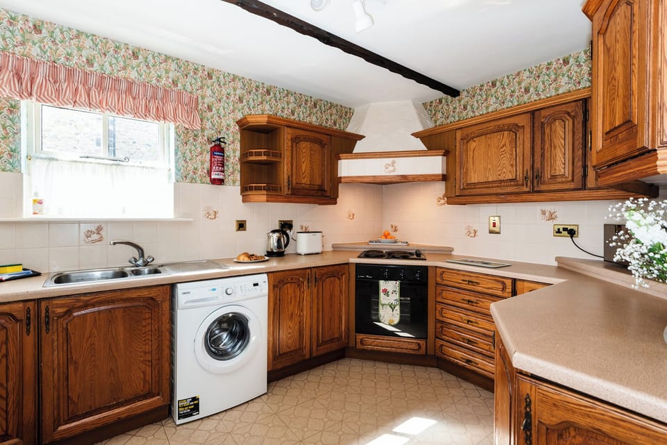 Fridge, microwave, cookware/dishes/utensils