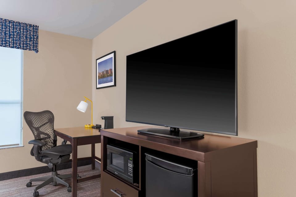 Hypo-allergenic bedding, down comforters, desk, laptop workspace