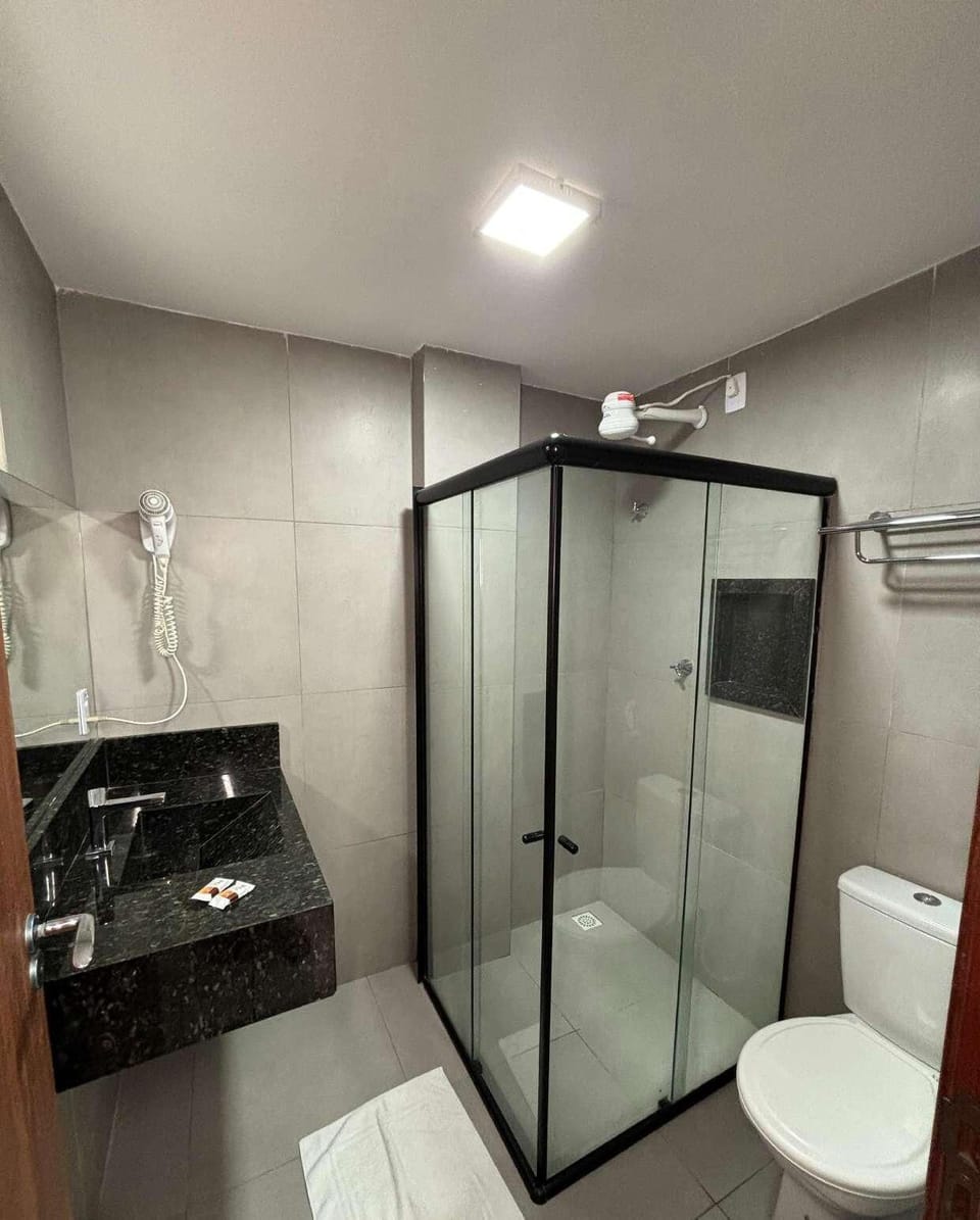 Standard Double Room | Bathroom | Shower, free toiletries, hair dryer, towels