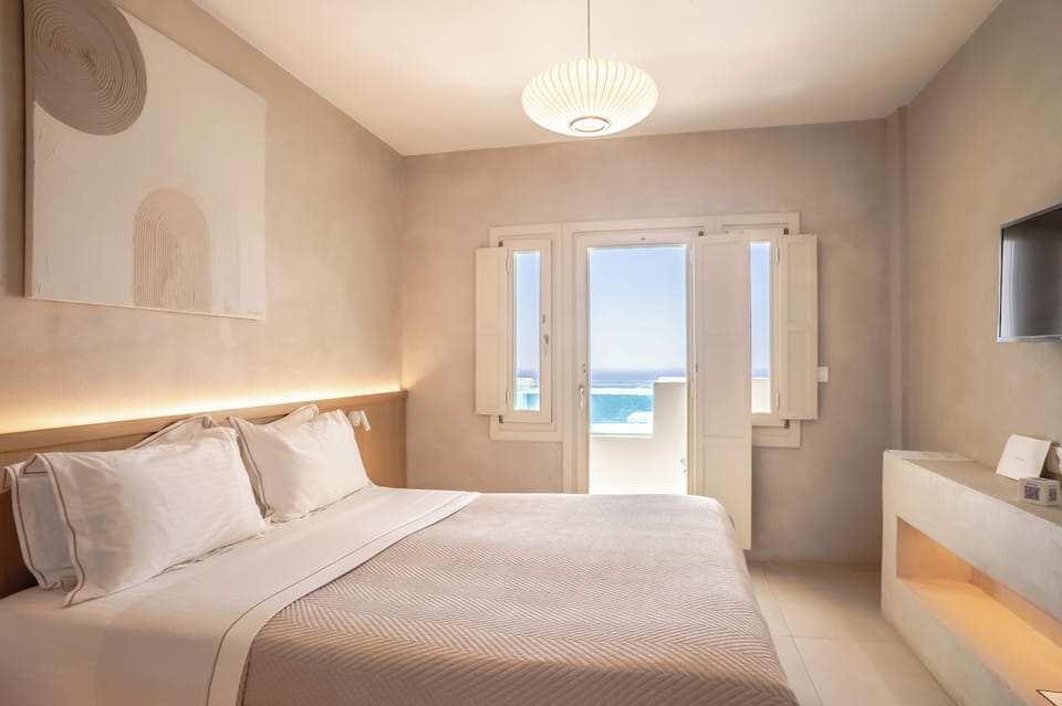 Crystal Deluxe Double with Hot Tub and Caldera View | Premium bedding, minibar, in-room safe, soundproofing