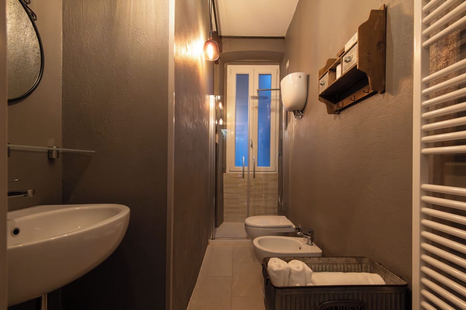 Superior Double or Twin Room | Bathroom | Combined shower/tub, hair dryer, bidet, soap