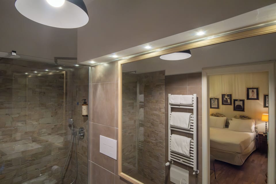 Deluxe Double or Twin Room | Bathroom | Combined shower/tub, hair dryer, bidet, soap