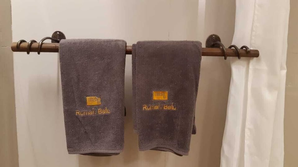 Shower, free toiletries, slippers