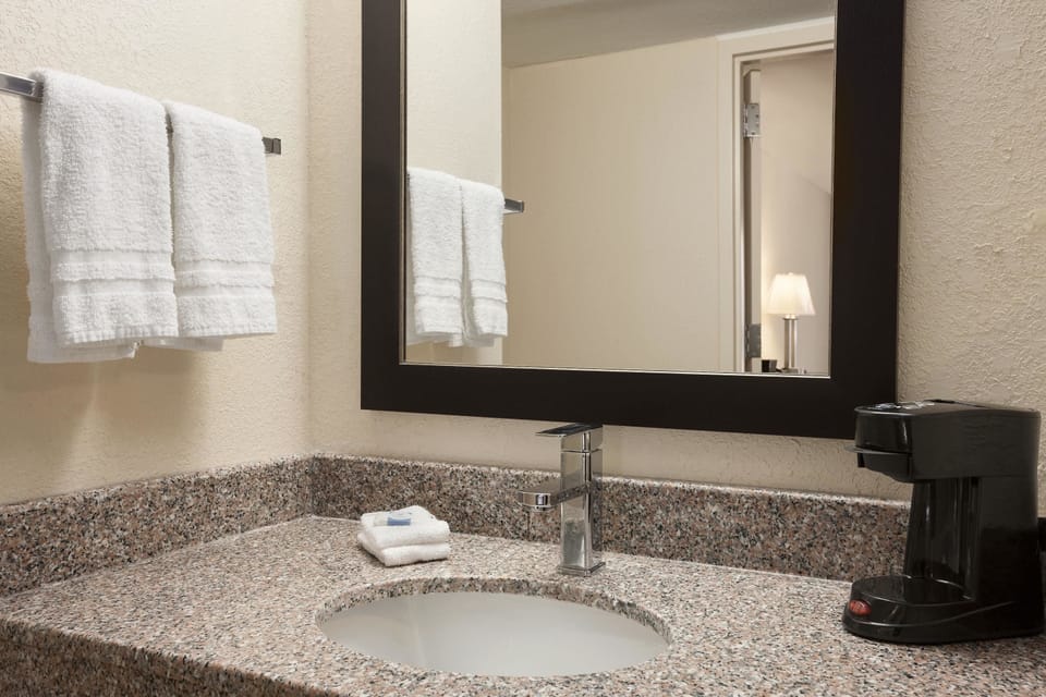 Separate tub and shower, free toiletries, hair dryer, towels