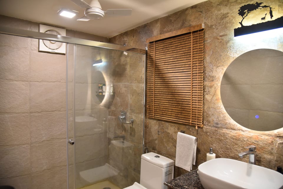 Shower, rainfall showerhead, free toiletries, hair dryer
