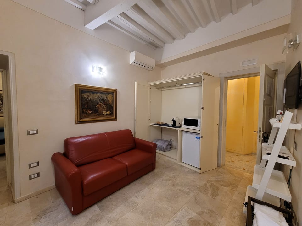 Apartment, 1 Bedroom | Living area | Flat-screen TV