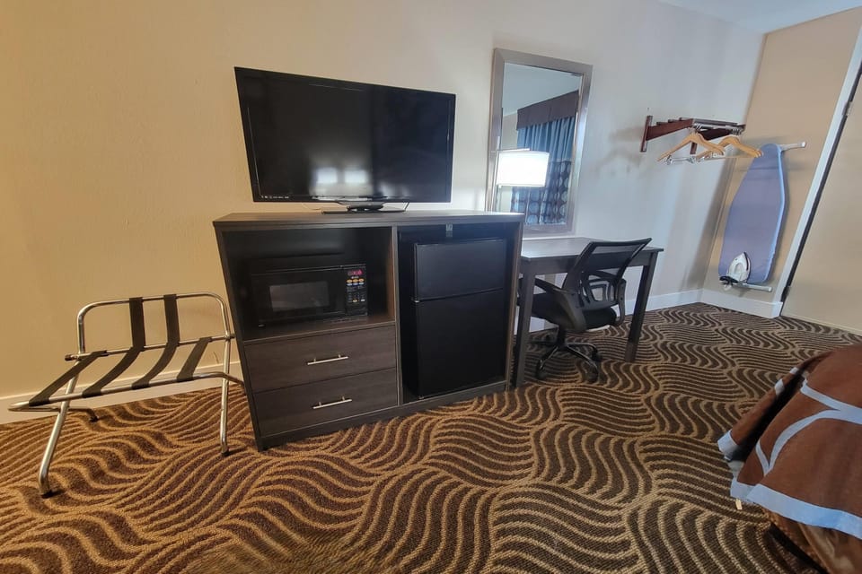 Desk, iron/ironing board, free cribs/infant beds, rollaway beds