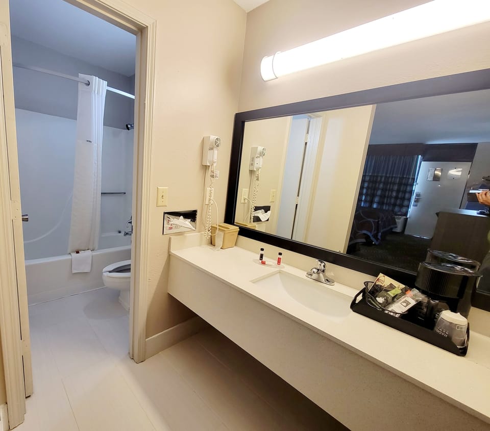 Combined shower/tub, eco-friendly toiletries, hair dryer, towels