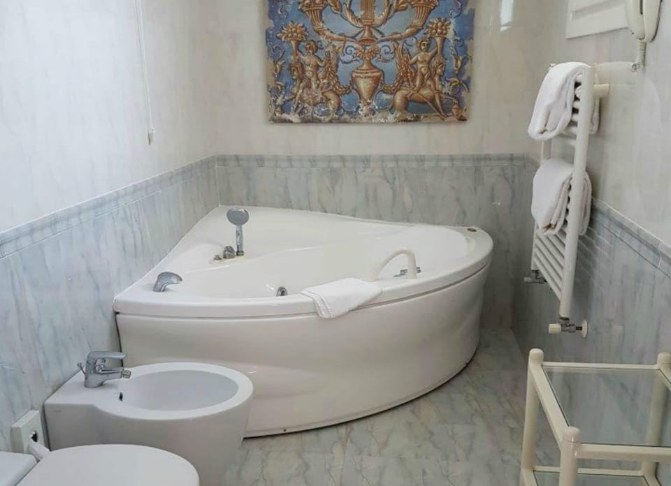 Free toiletries, hair dryer, bidet, towels