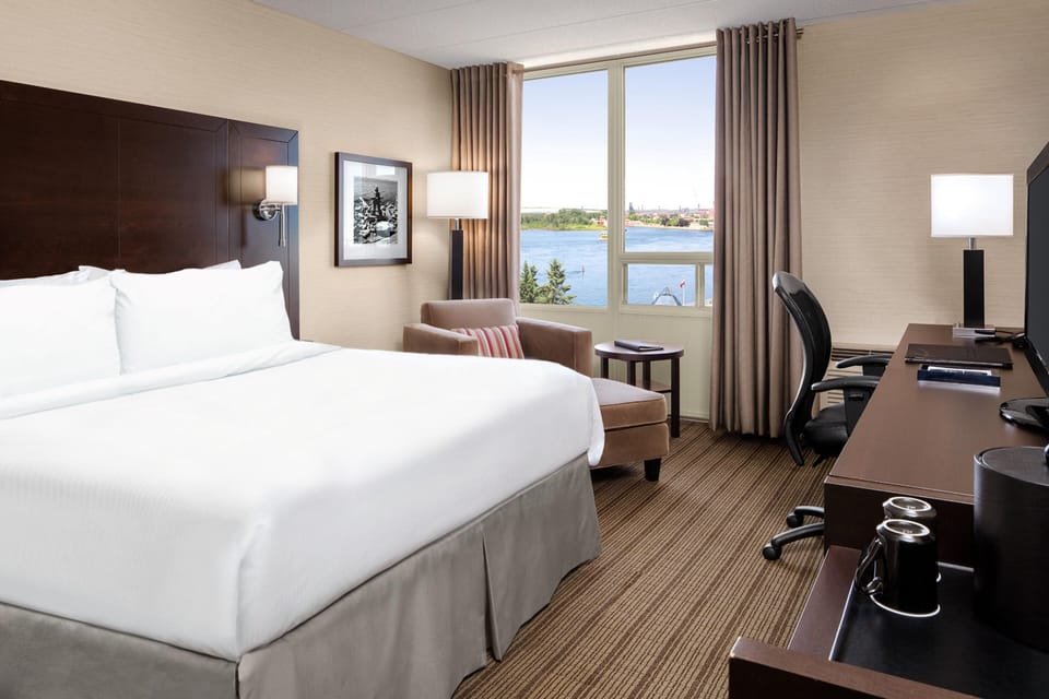 Hypo-allergenic bedding, pillowtop beds, desk, laptop workspace