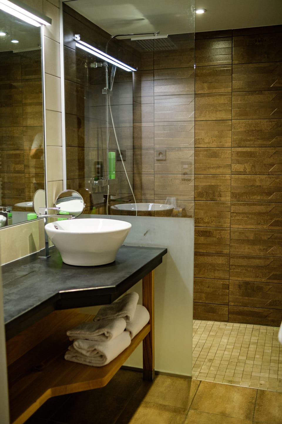 Shower, rainfall showerhead, hair dryer, towels