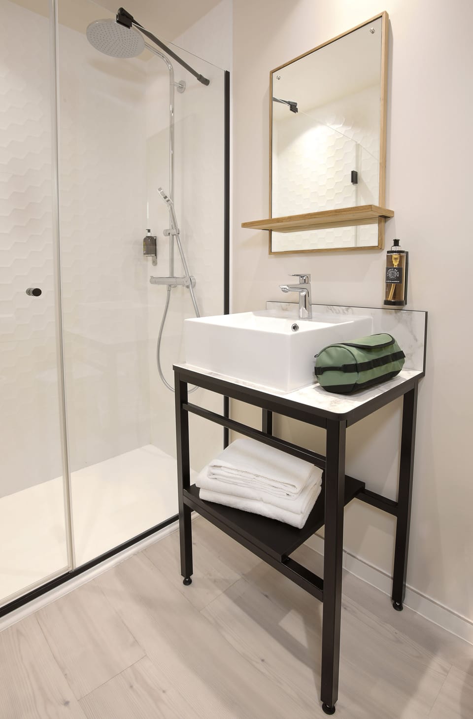 Shower, rainfall showerhead, eco-friendly toiletries, towels