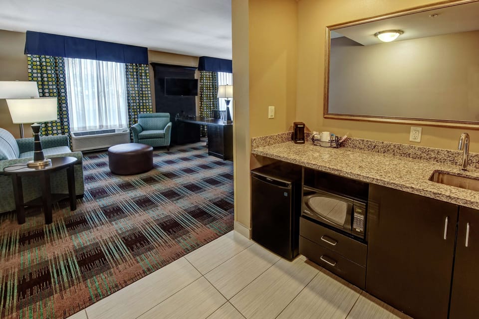 Studio, 1 King Bed, Accessible, Non Smoking (Roll-in Shower) | Living area | 39-inch flat-screen TV with cable channels, TV