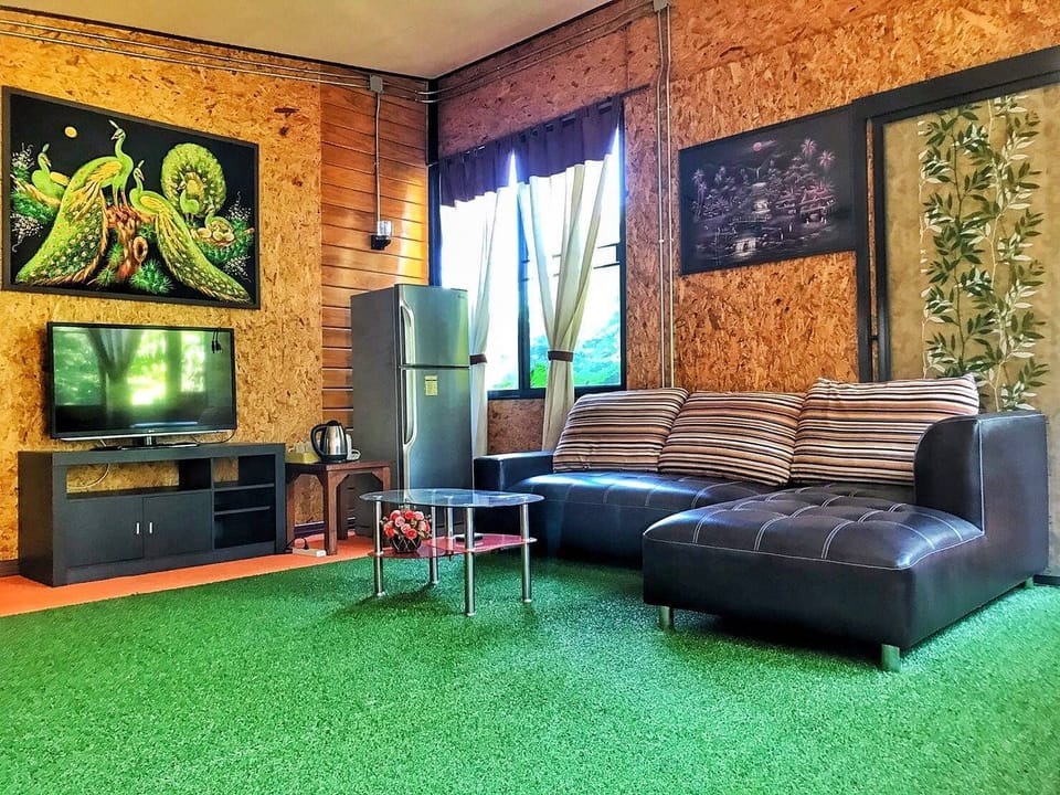 Family Suite | Living area | Flat-screen TV