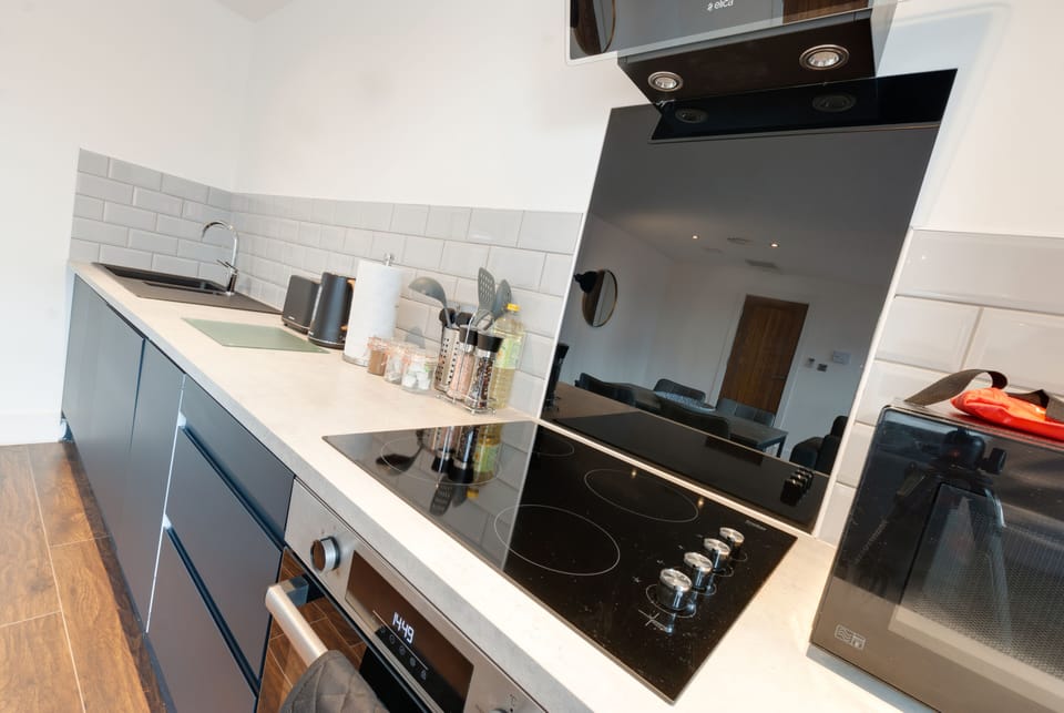Apartment | Private kitchen | Full-size fridge, microwave, oven, stovetop