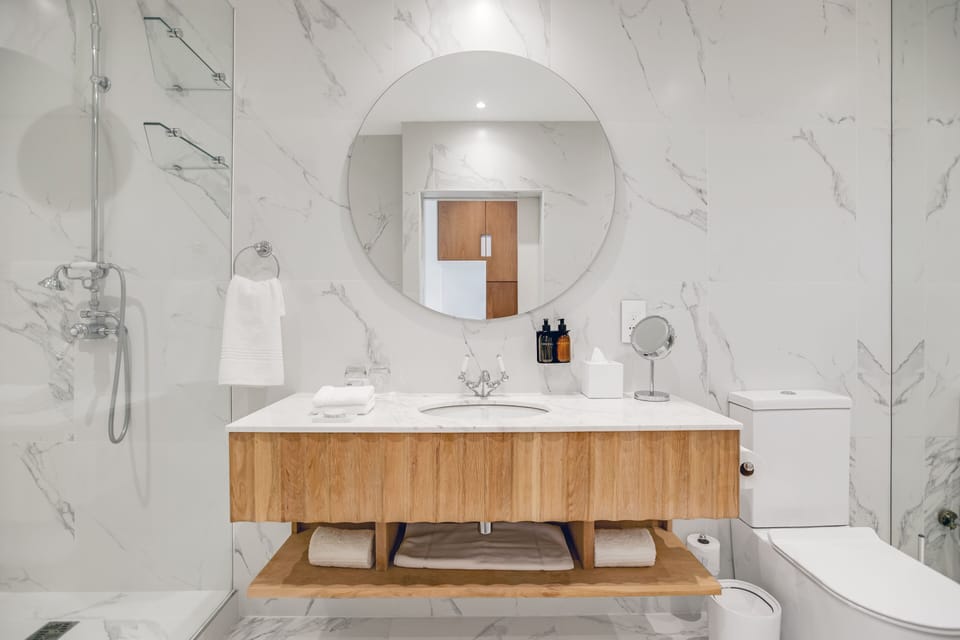 Designer toiletries, hair dryer, towels