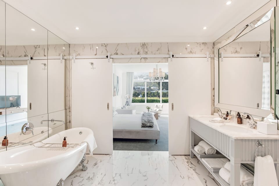 Superior Room | Bathroom | Designer toiletries, hair dryer, towels