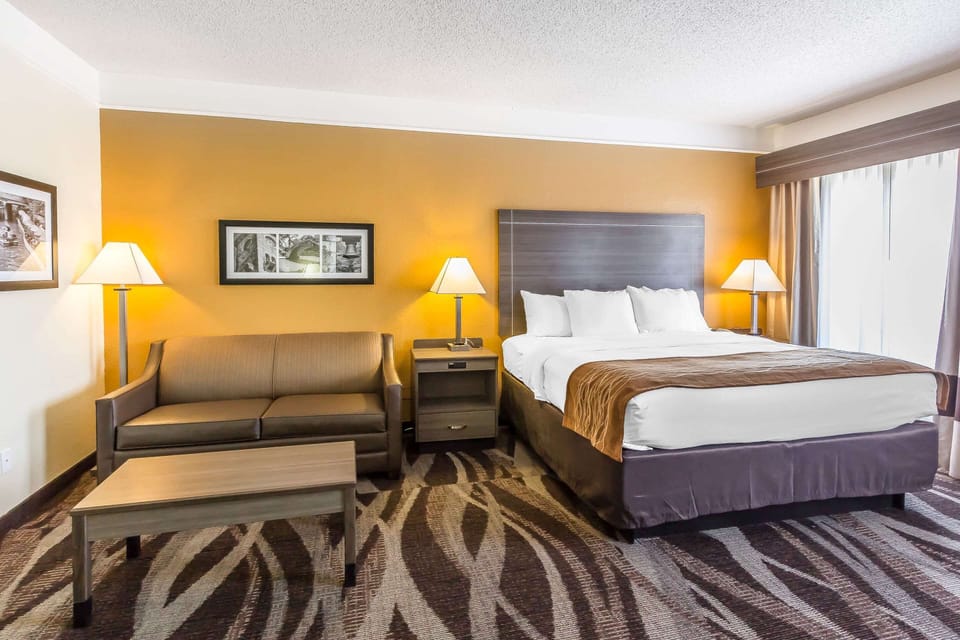Suite, 1 King Bed, Non Smoking | Desk, blackout drapes, iron/ironing board, cribs/infant beds
