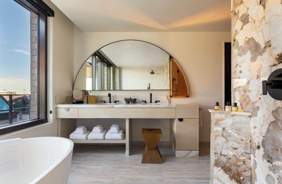 Designer toiletries, hair dryer, bathrobes, slippers