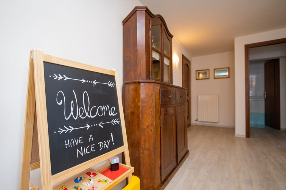 Family Apartment, 2 Bedrooms | Living area | Flat-screen TV