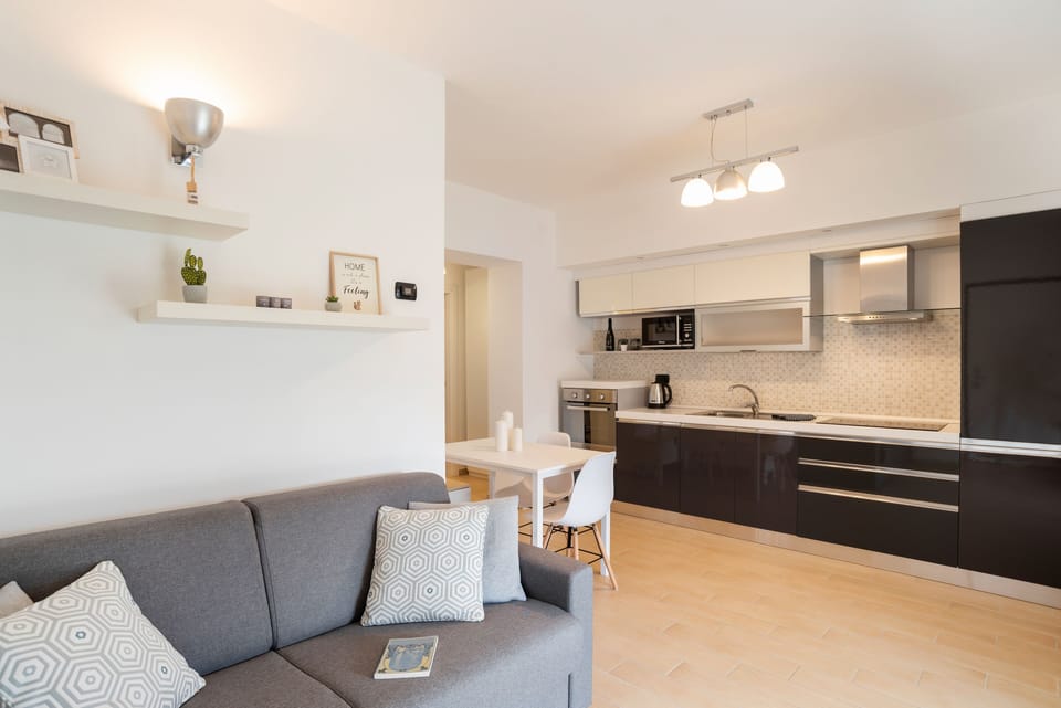 Panoramic Apartment | Living area | 30-inch TV with digital channels