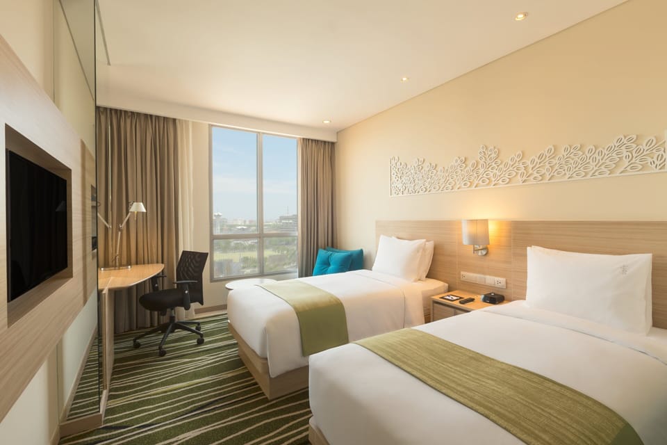 Premium bedding, down comforters, pillowtop beds, in-room safe