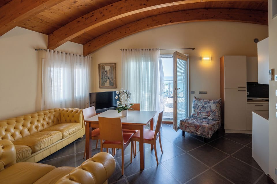 Suite (4 People) | Minibar, in-room safe, desk, soundproofing