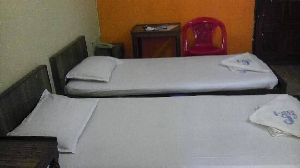 Room (Non AC) | Desk, bed sheets