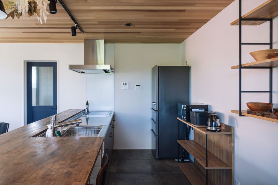 Luxury Villa | Private kitchen | Fridge, microwave, stovetop, electric kettle