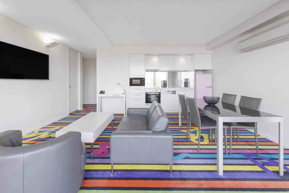 Room, Multiple Beds (Residence) | Living area | 50-inch Smart TV with digital channels, TV