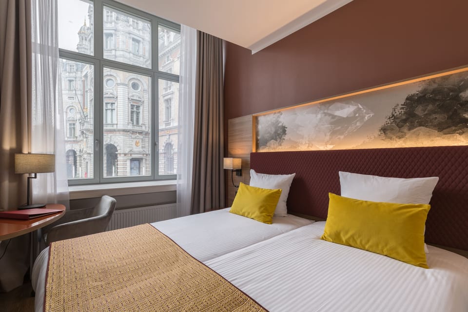 Hypo-allergenic bedding, minibar, in-room safe, desk