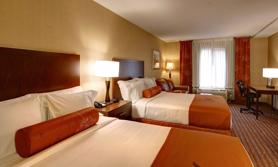 Premium bedding, pillowtop beds, desk, blackout drapes