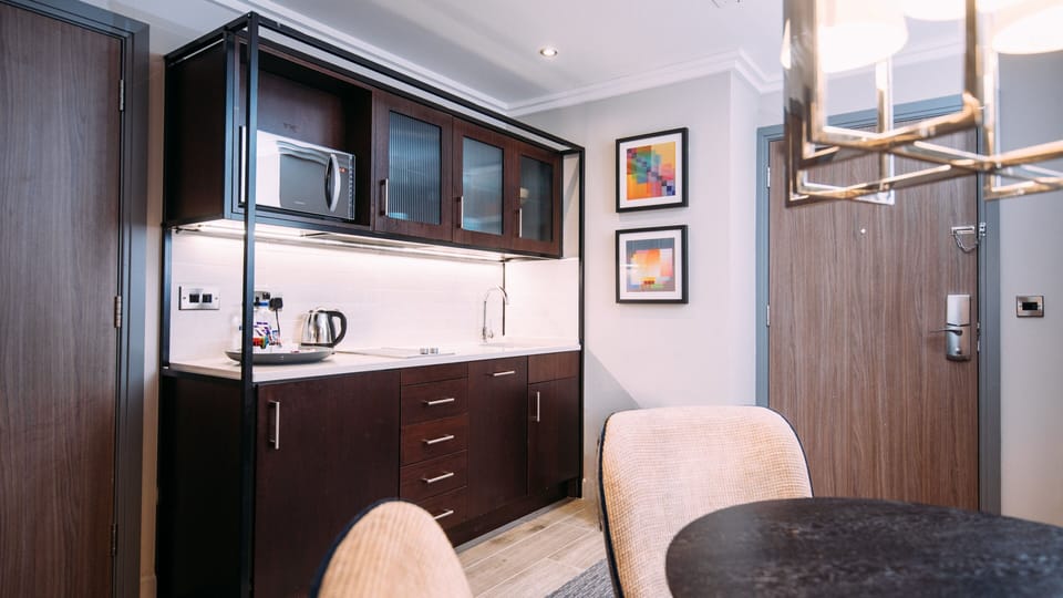 Suite, 1 Bedroom | In-room safe, desk, iron/ironing board, free WiFi