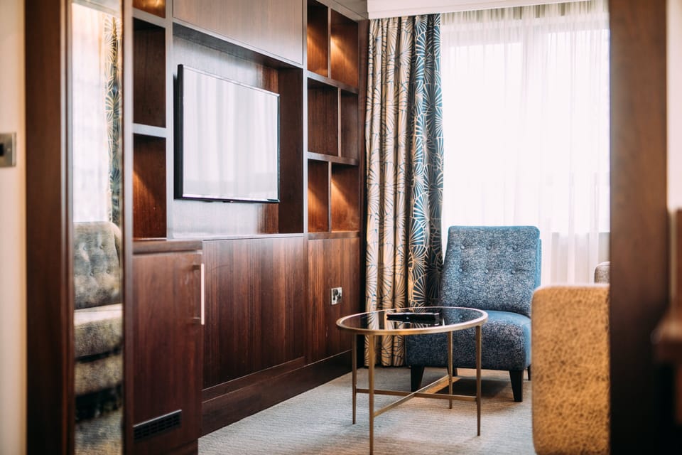 Junior Suite, 1 King Bed (Additional Living Area) | In-room safe, desk, iron/ironing board, free WiFi