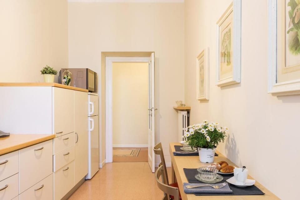 City Apartment | Living area | 30-inch TV with digital channels