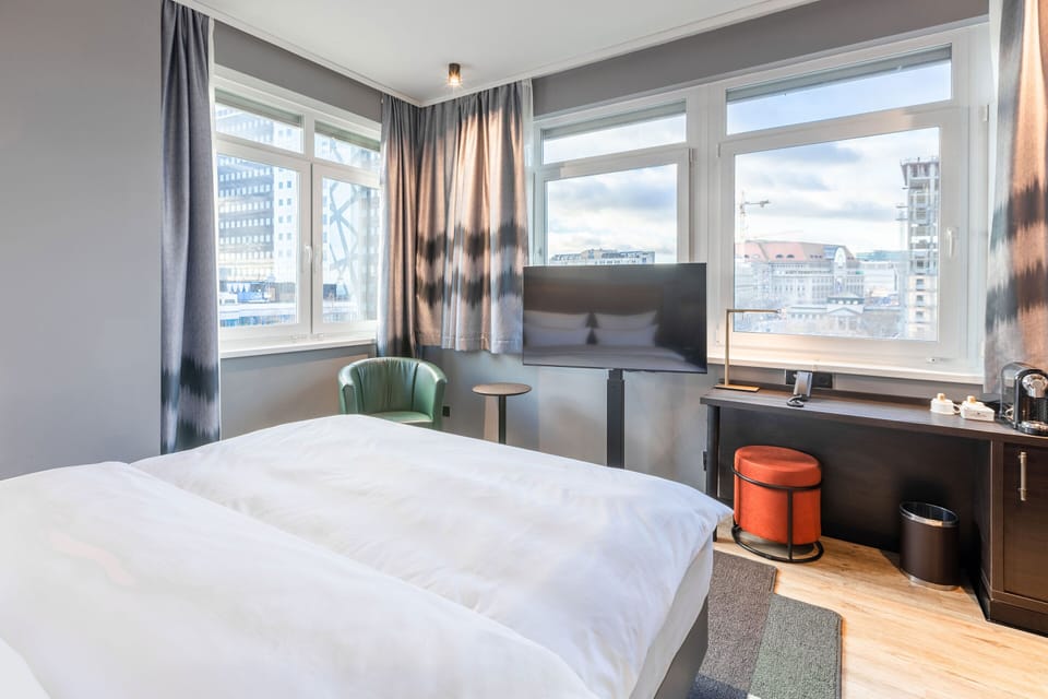 Superior Double Room | Minibar, in-room safe, desk, laptop workspace