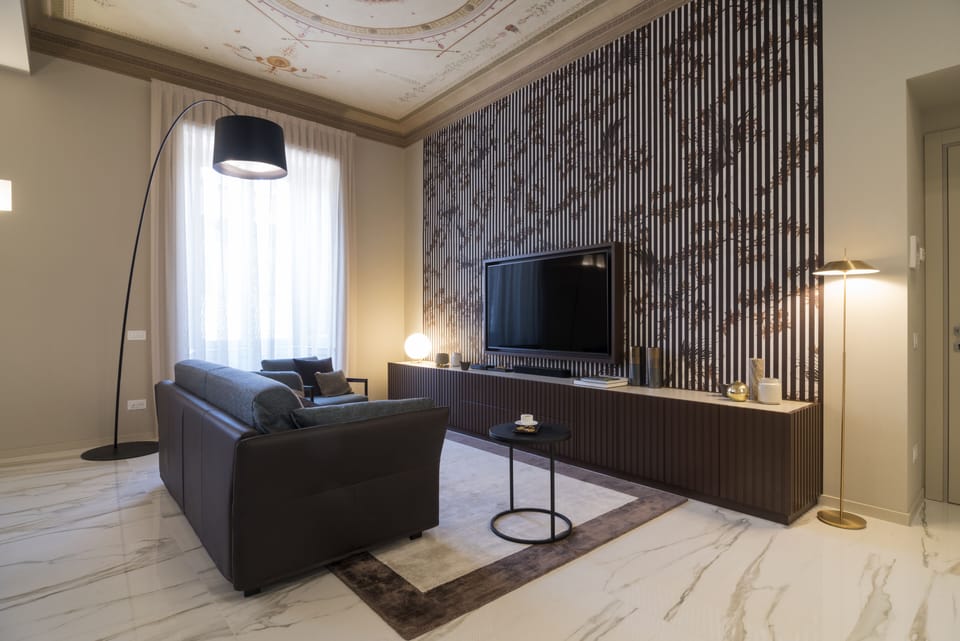 City Apartment | Living area | 30-inch TV with digital channels